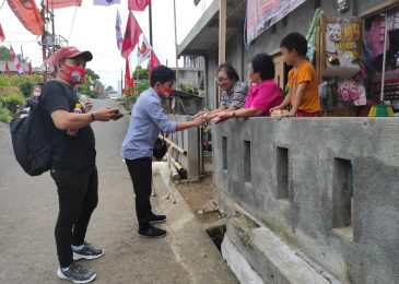 Menekan Angka Penyebaran Covid-19, Relawan Milenial Tomohon for WL Bagikan Seribu Masker ke Masyarakat