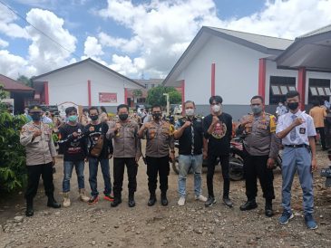 Cegah Penyebaran Covid-19, GMBI KSM Kauditan Ikut Amankan Kegiatan Vaksinasi Bersama Polsek dan Polres Minut