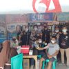 Berkolaborasi Bersama PMI dan Camat Kema, GMBI Naik Turun Rumah Warga Lakukan Vaksinasi